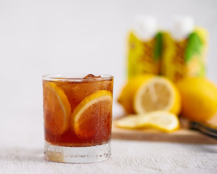Iced tea with lemon served in a glass